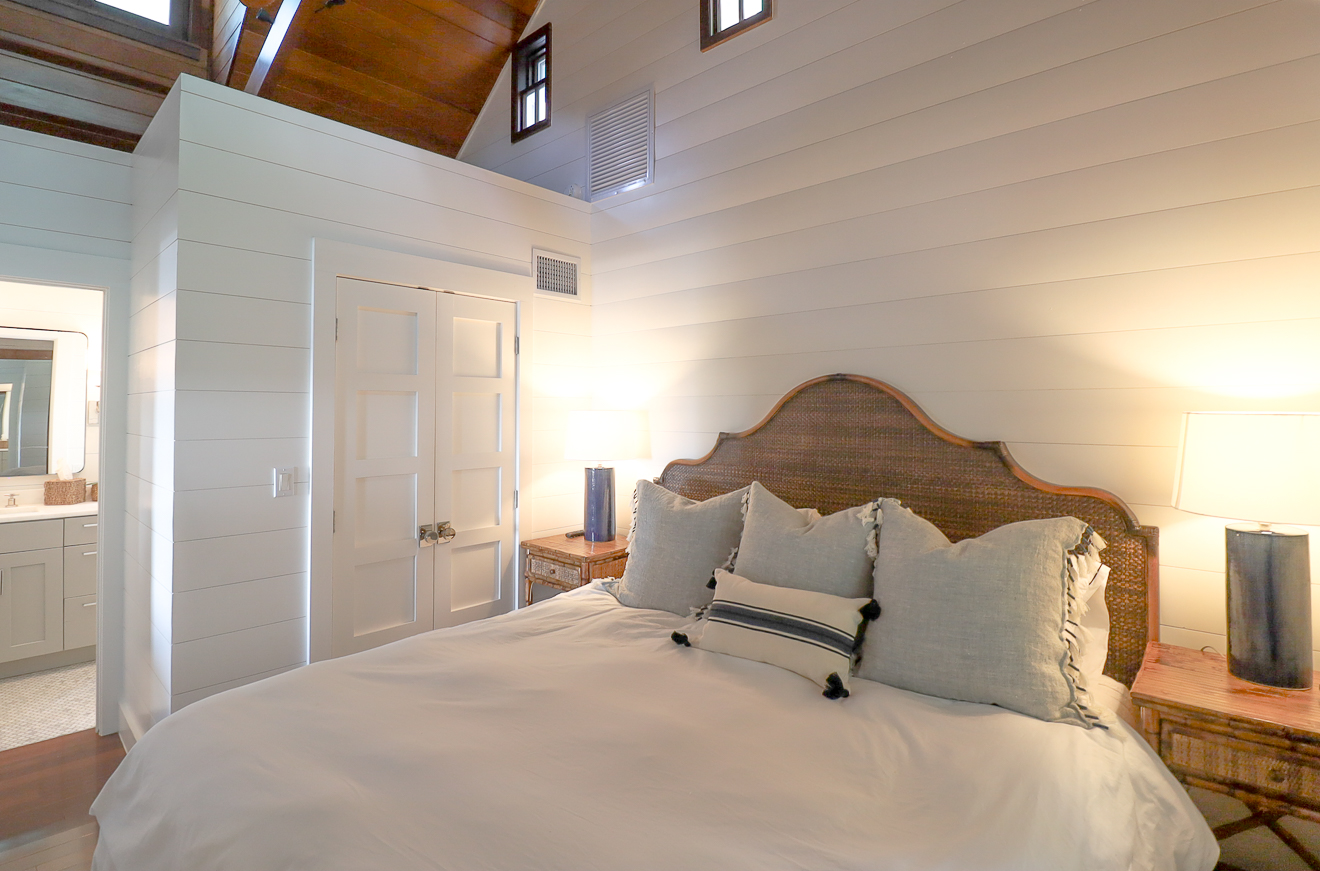 Cottage One bedroom with cedar ceiling at Hummingbird Cottages