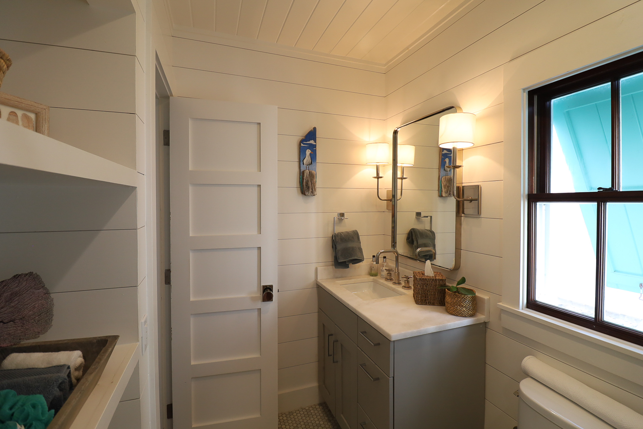 Cottage One private bathroom with shiplap walls